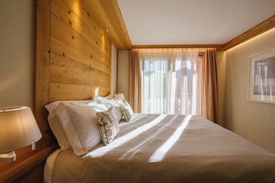 Suite | Premium bedding, down comforters, memory foam beds, minibar