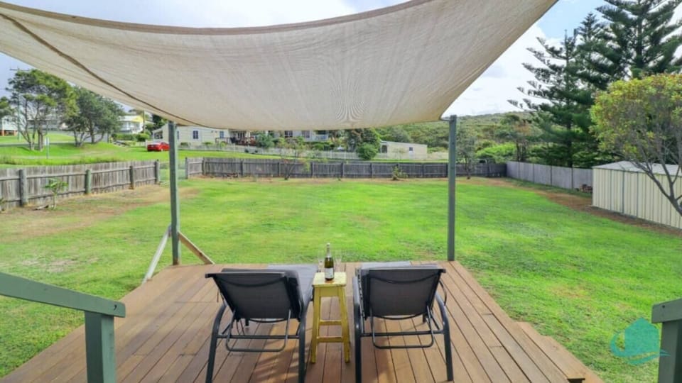 Large back yard, dog friendly with two comfy sun beds.