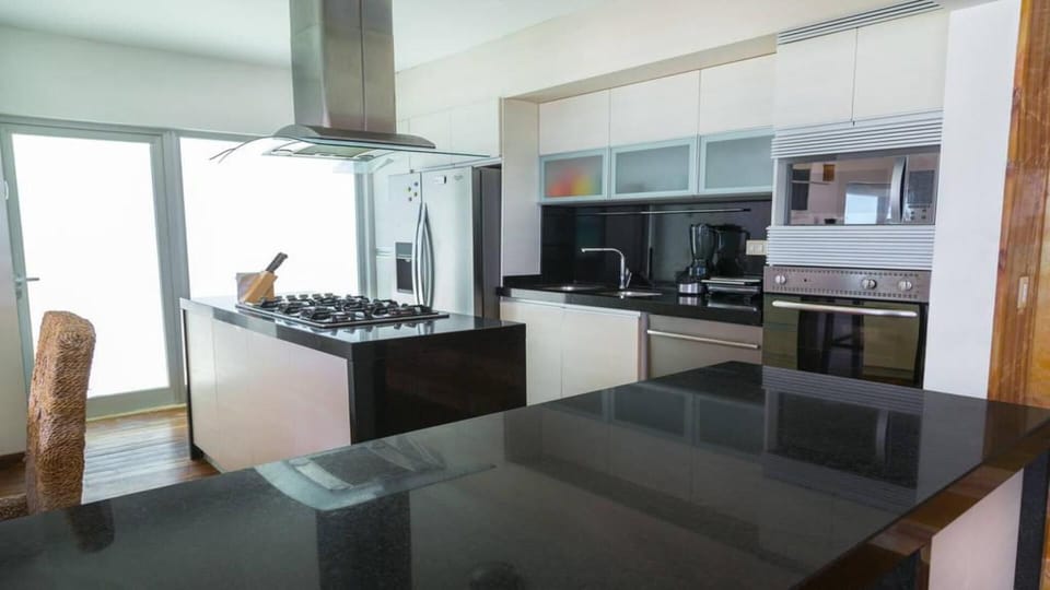 Fully appointed Kitchen with Stainless Steel appliances & Granite countertops