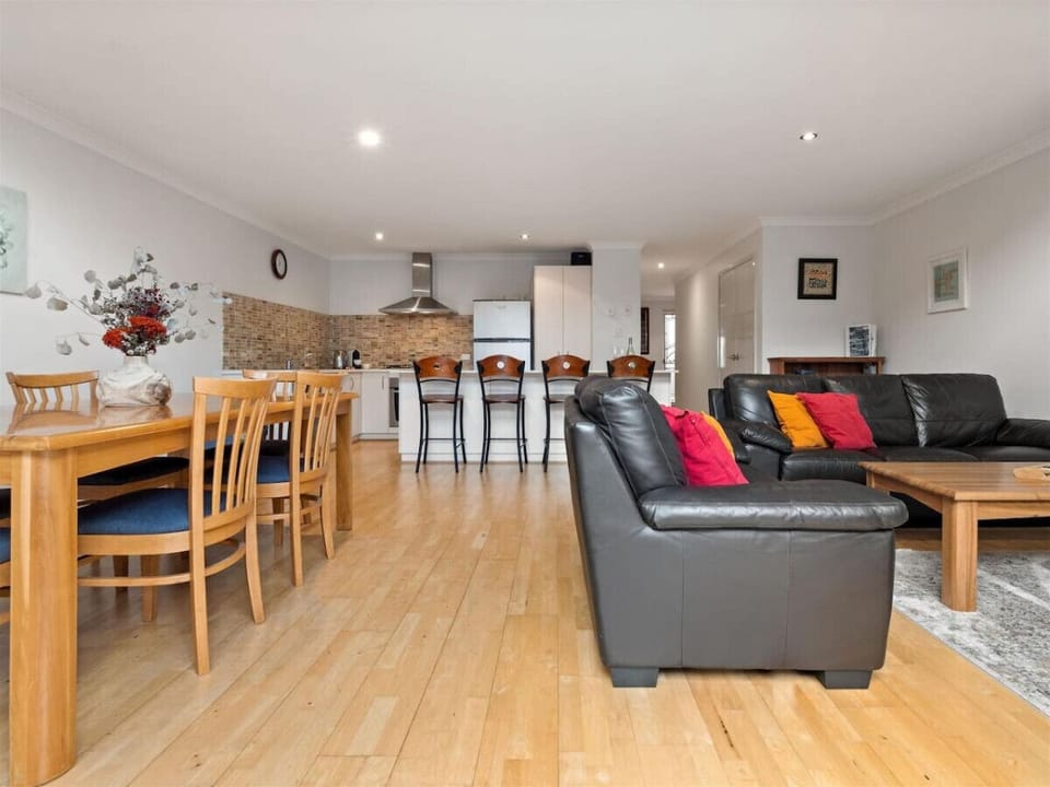 Living room and dining area w/ Air-conditioning & Ceiling Fan