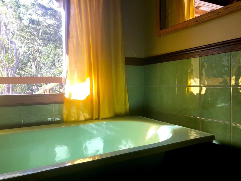 ... luxuriating in the clawsfoot bath watching the sun go down ...