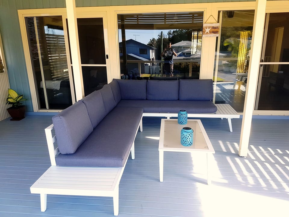 outdoor setting, enough room for 10 people to sit.