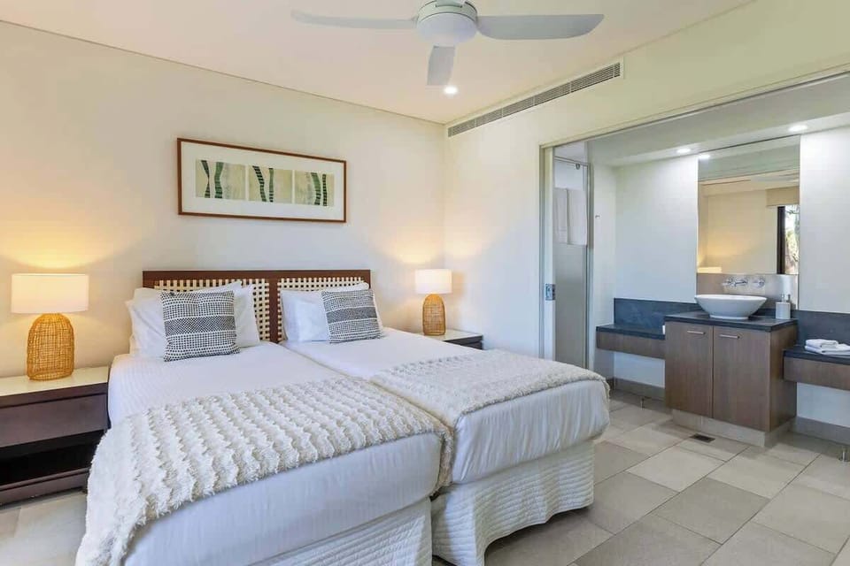 The second bedroom also offers cooling and an attached ensuite.