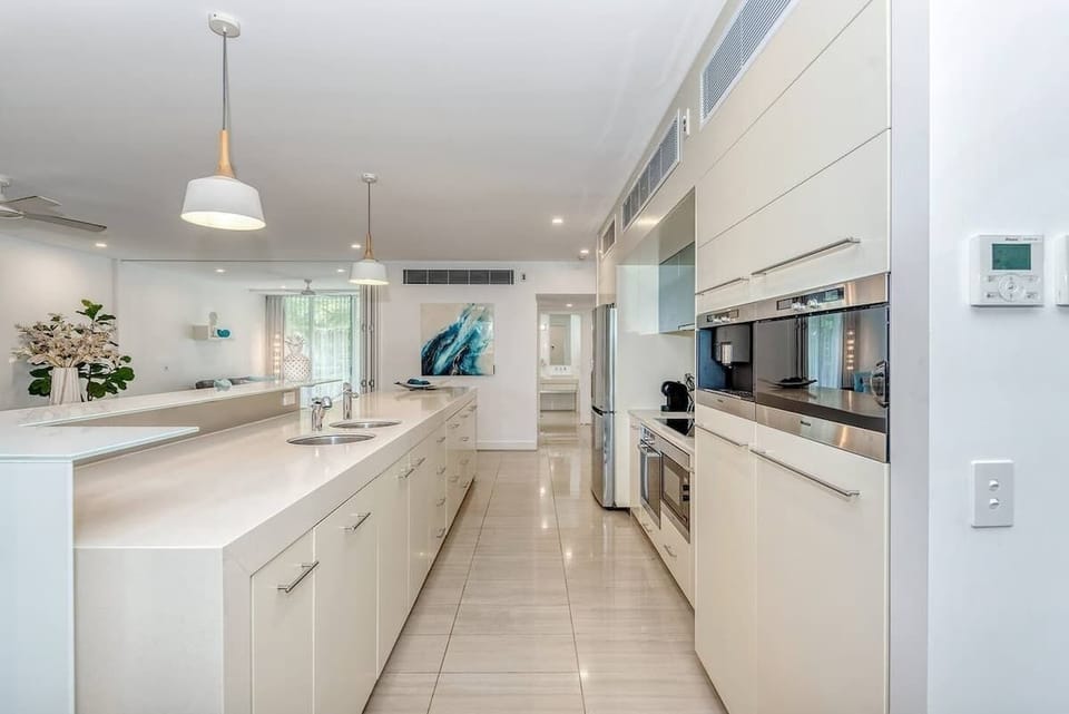 Prepare meals with ease in the fully equipped and modern kitchen.