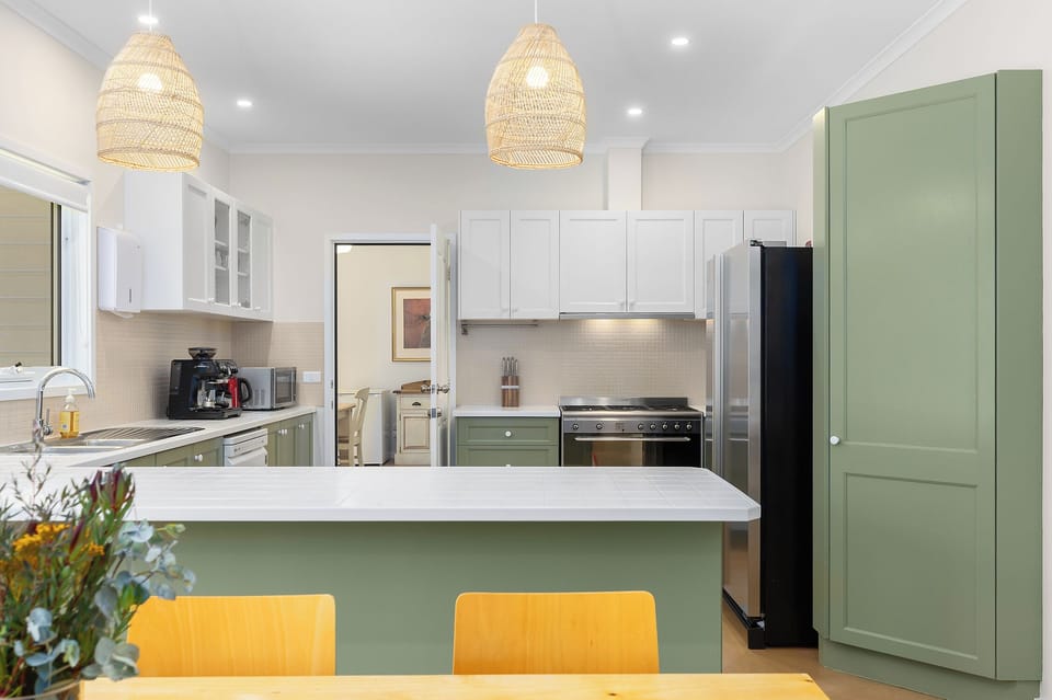 Kitchen showing door to Residence - this is the dual key door that is locked