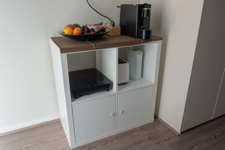 And the cooking area which has changed. It now has a large marble top, not shown