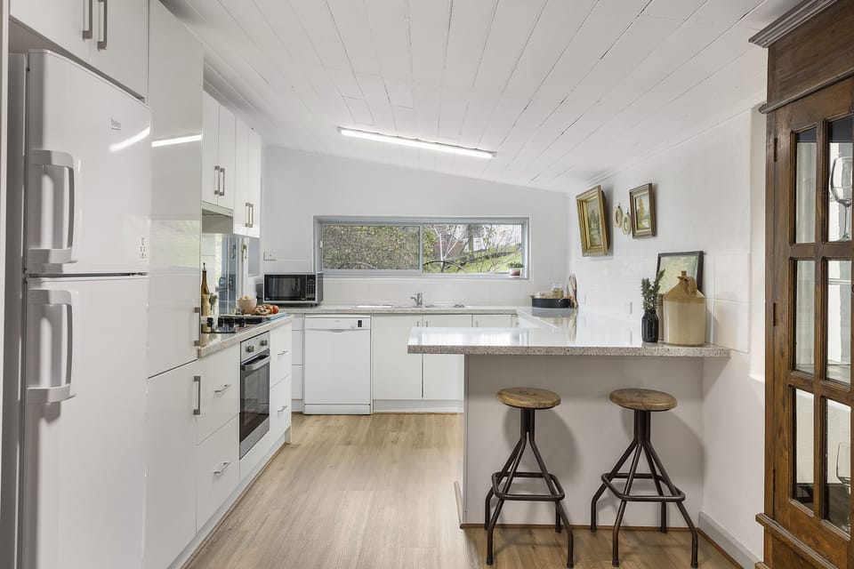 Kitchen view 1: Fully equipped kitchen with garden views