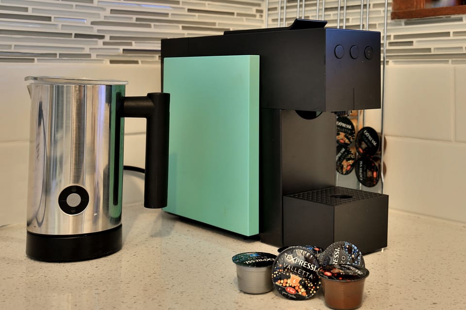 Coffee Machine, Frother, & Pods complimentary