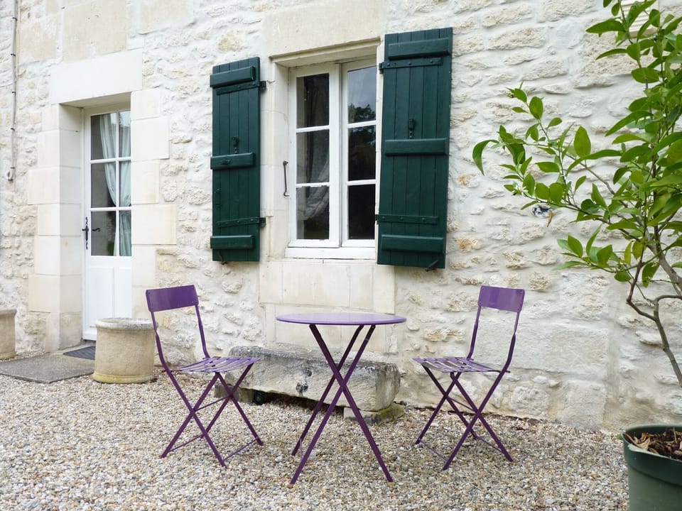 Enjoy the sun out on the terrace. Big garden table, easy chairs, hammock as well