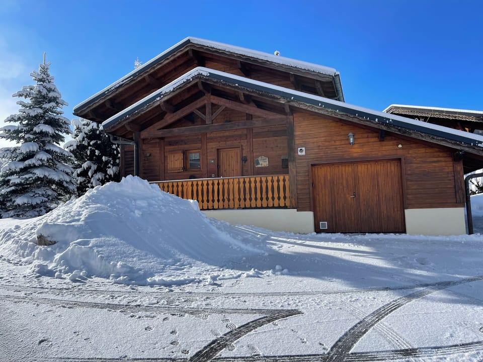 Chalet Bleu in winter with snow 
