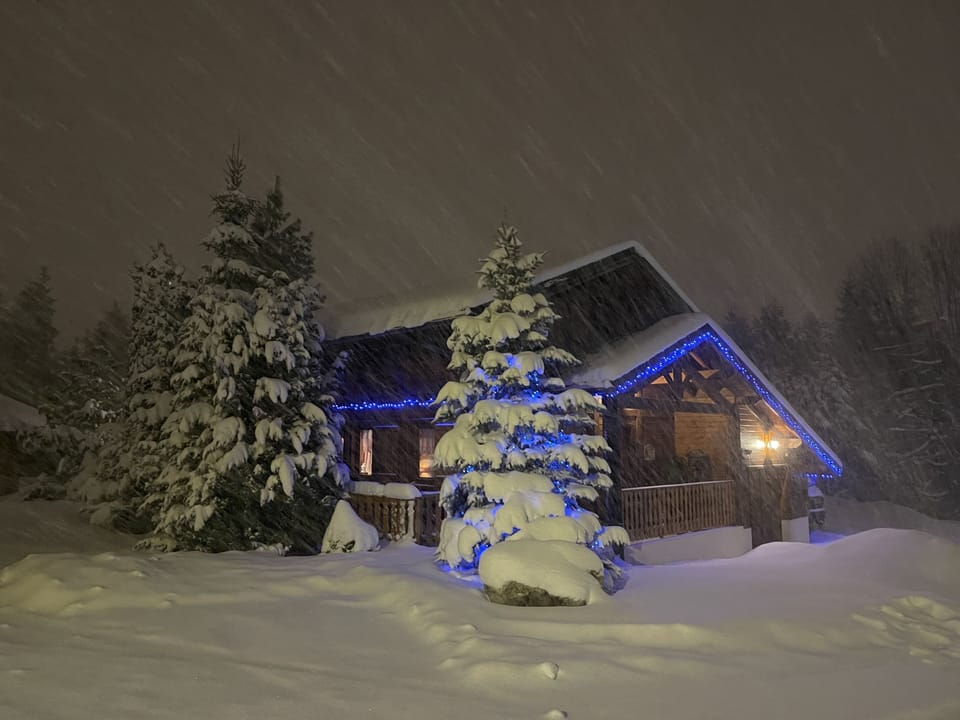 Chalet Bleu in Winter covered in snow