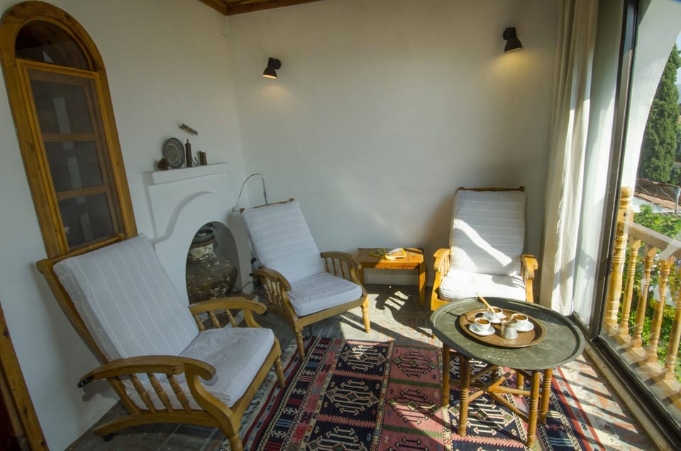Master bedroom private sitting room with garden view