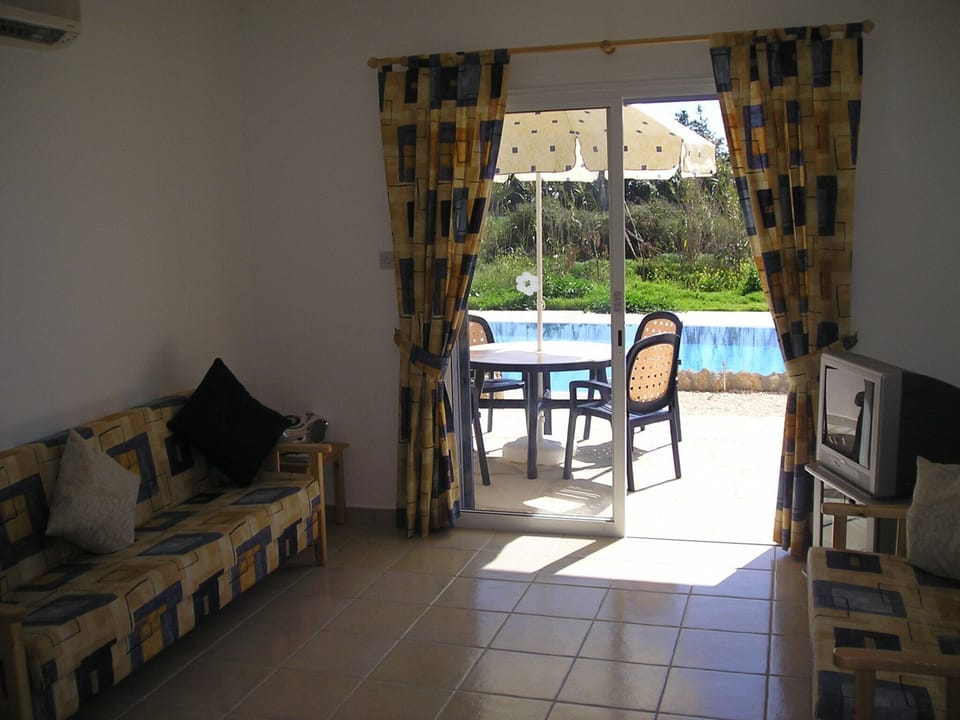 Comfortable open plan lounge leading out to the pool