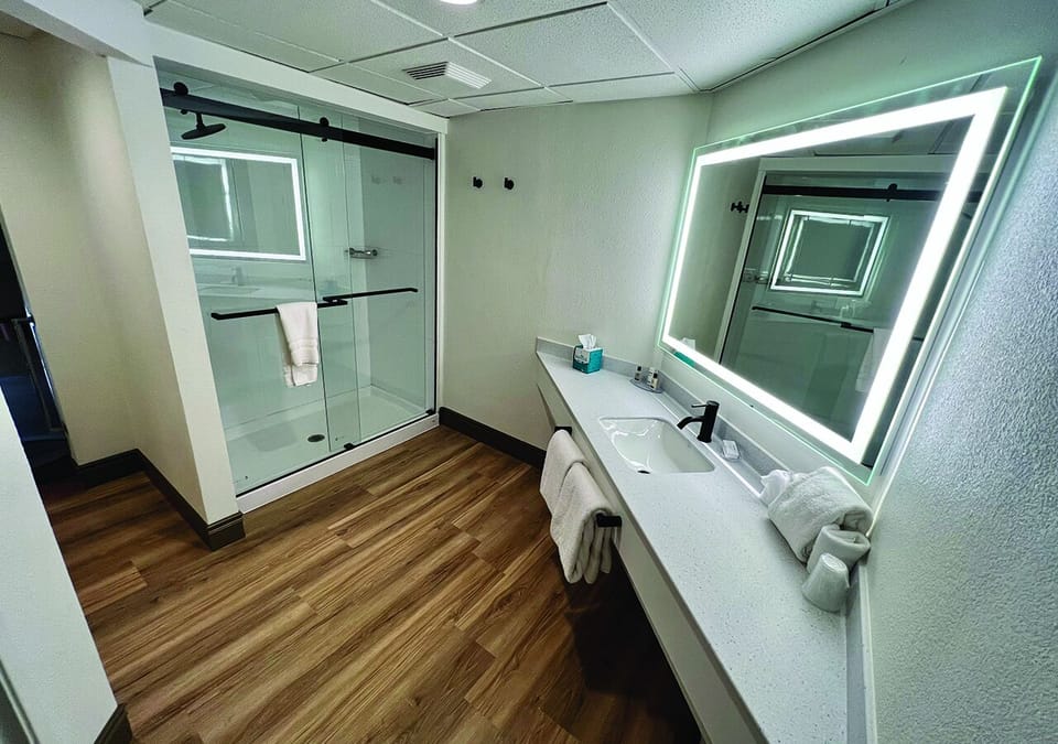 Champagne Tower | Bathroom | Free toiletries, hair dryer, towels