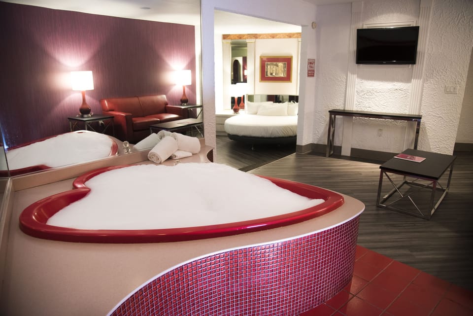Garden of Eden Apple | Blackout drapes, iron/ironing board, free WiFi, bed sheets