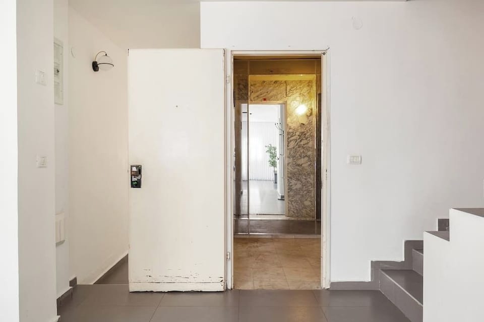 Secure Apartment entrance provides peace of mind while staying in quiet and convenient coastal location.