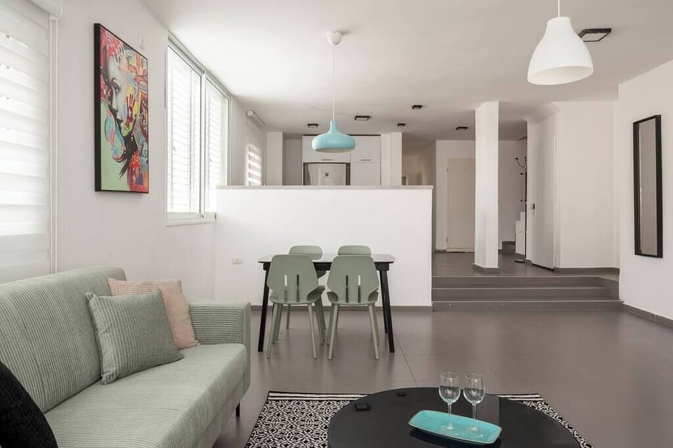 Airy interior filled with natural light delivers cozy atmosphere frequently highlighted in positive stay experiences.