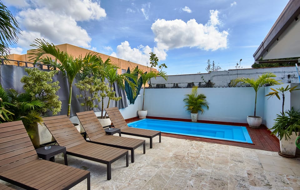 The terrace with private pool and lounge area