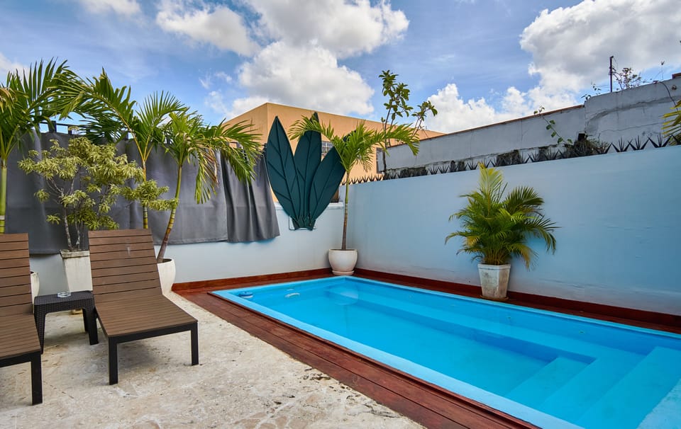 The terrace with private pool and lounge area