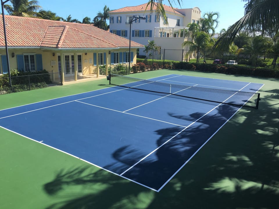 Tennis racquets and balls provided at reception desk