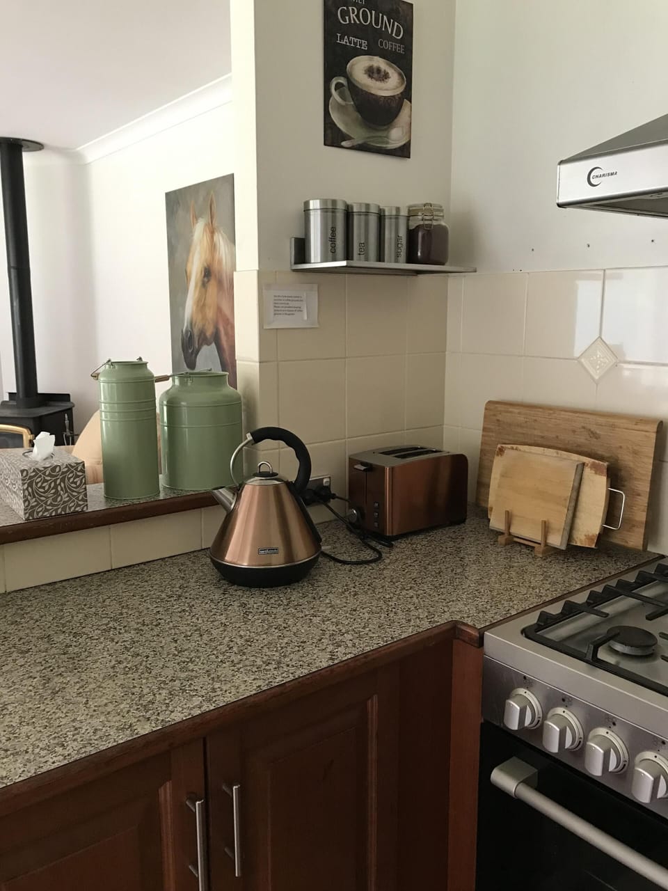 Kitchen adjoins family room, combustion fireplace provides  super heat in winter