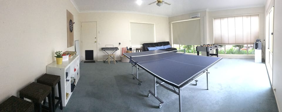 Games room with foosball, ping pong, darts, keyboard and board games
