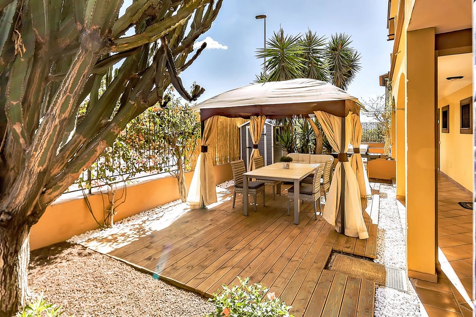 Large terrace with a tent to hide from the sun