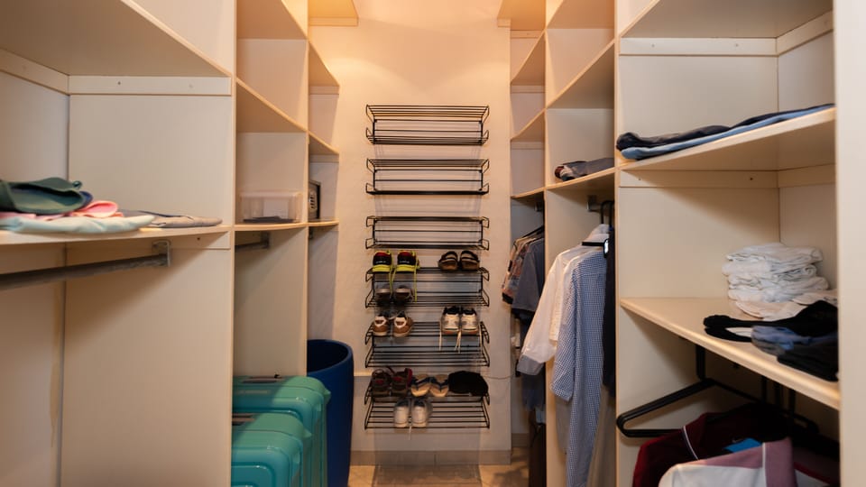 Walk-in closet with safe at the master bedroom