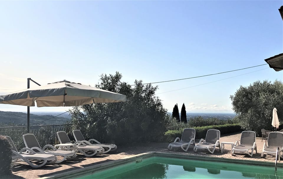 Outdoor pool, pool umbrellas, sun loungers