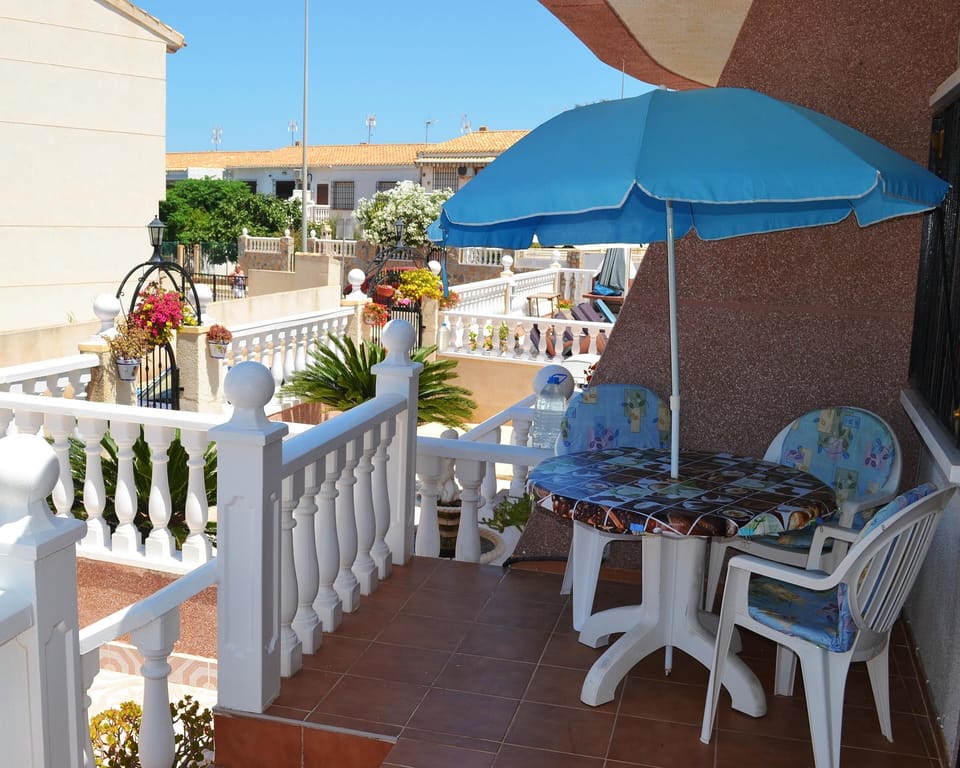 Cabo Roig sun downstairs terrace table