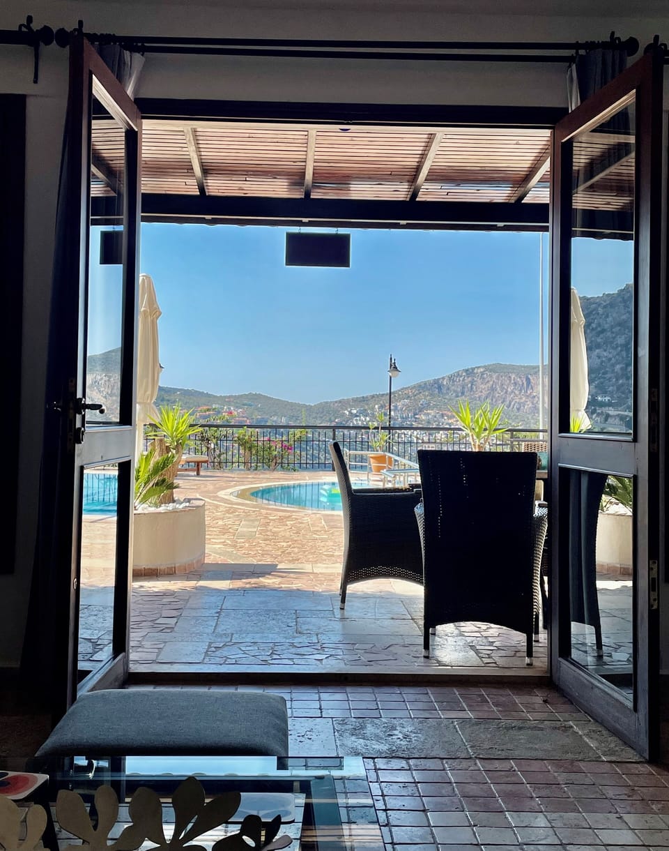Doors leading to private covered terrace