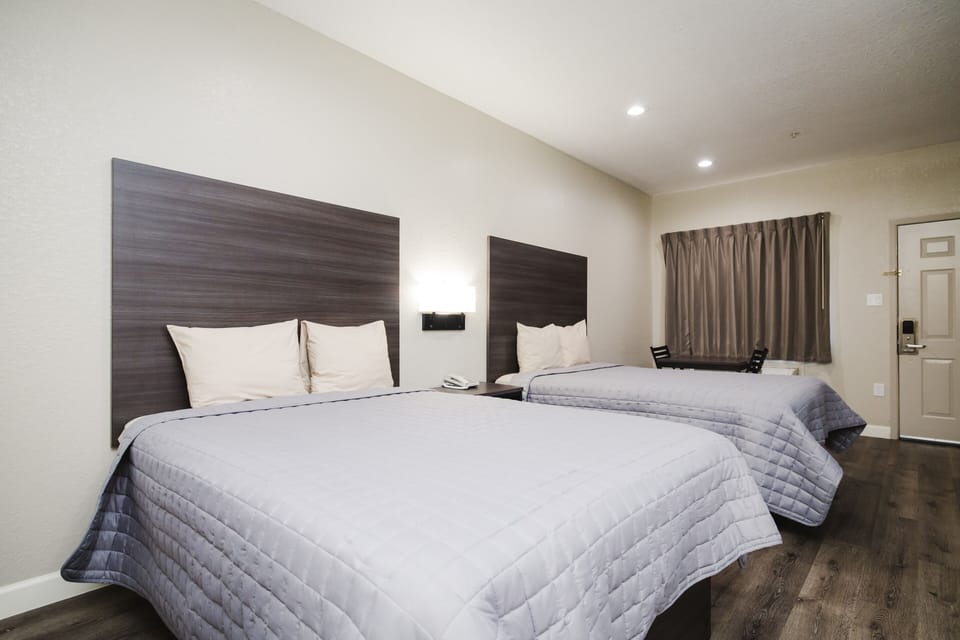 Premium bedding, down comforters, pillowtop beds, desk