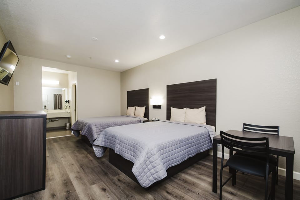 Premium bedding, down comforters, pillowtop beds, desk