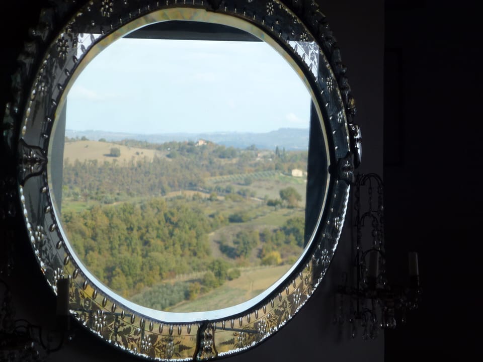 View reflected from kitchen in Venetian mirror