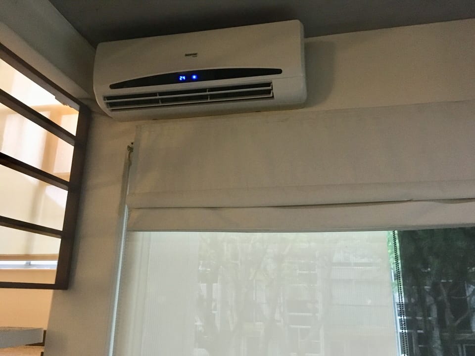 AC in living-dinning-kitchen 50m2 area.