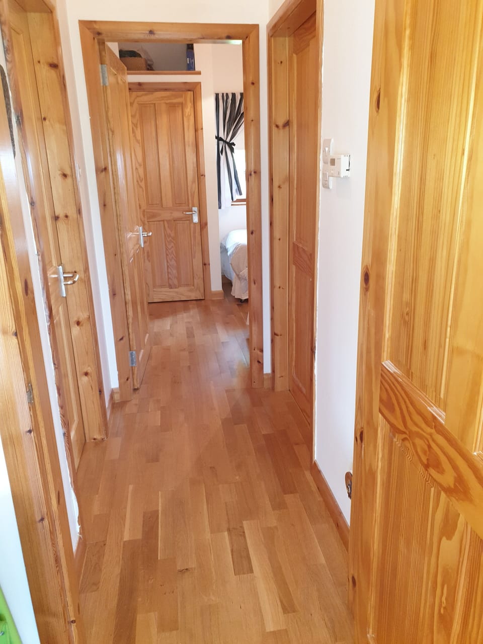 Main Hallway into bedrooms and bathrooms