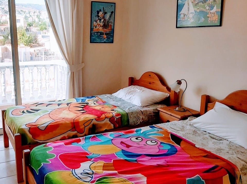 2nd BEDROOM WITH TWO BEDS AND A PRIVATE SHOWER+WC- CHILDRENS' ROOM