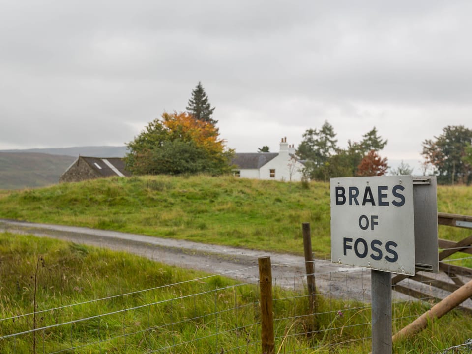 Sign on the road at the Farmhouse entrance