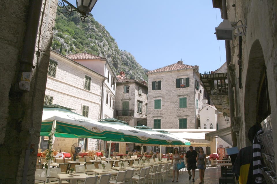 Museum square - apartment entrance down alley exactly in centre past Giardino's.