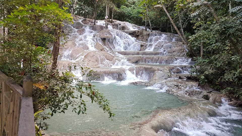 Dunns River Fall, a short drive away, where you can climb the falls, and swim