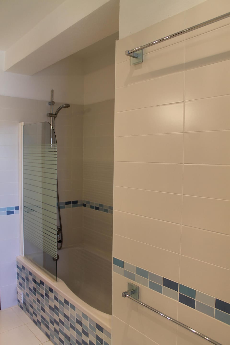 Family bathroom with shower and bath
