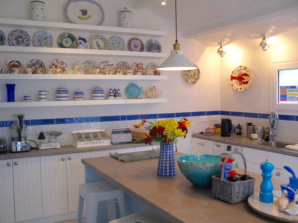 Well equipped kitchen, central island and 4 bar stools - perfect for breakfast