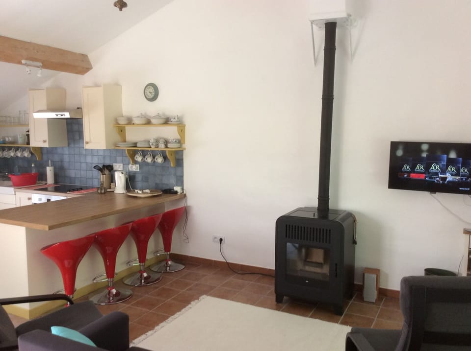 top floor sitting area overlooking breakfast bar towards kitchen area.