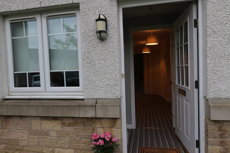 Main door to apartment with keyless entry.