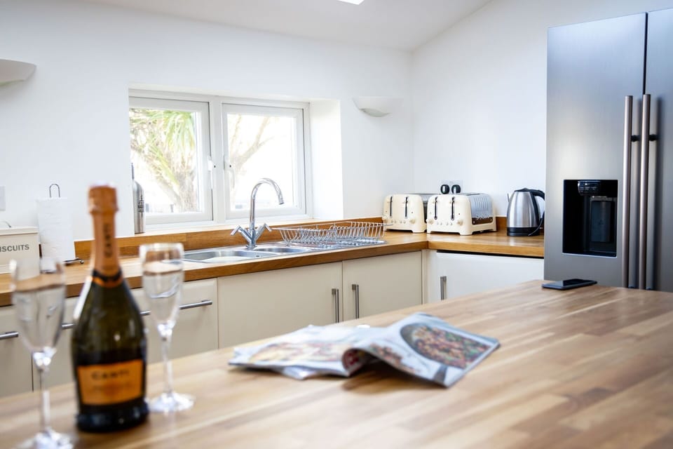 Kitchen with wooden counters at Foreshore Bude