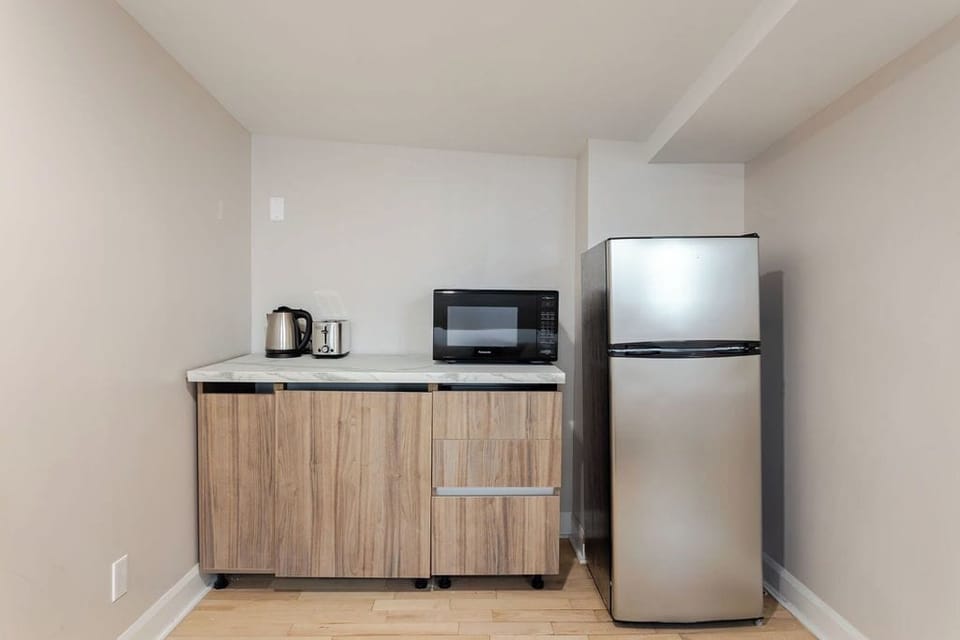 Deluxe Room, Multiple Beds | Desk, laptop workspace, iron/ironing board, free WiFi