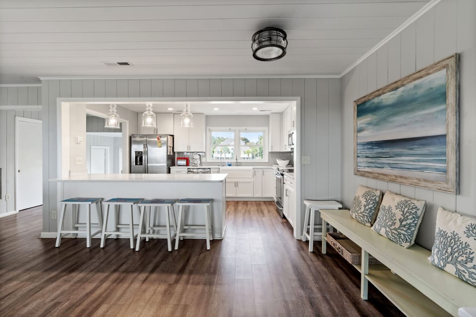 Extra seating at the kitchen counter comes in handy.