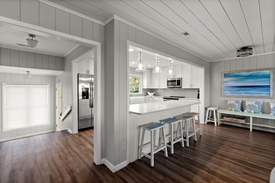 The open kitchen allows for conversation while cooking.