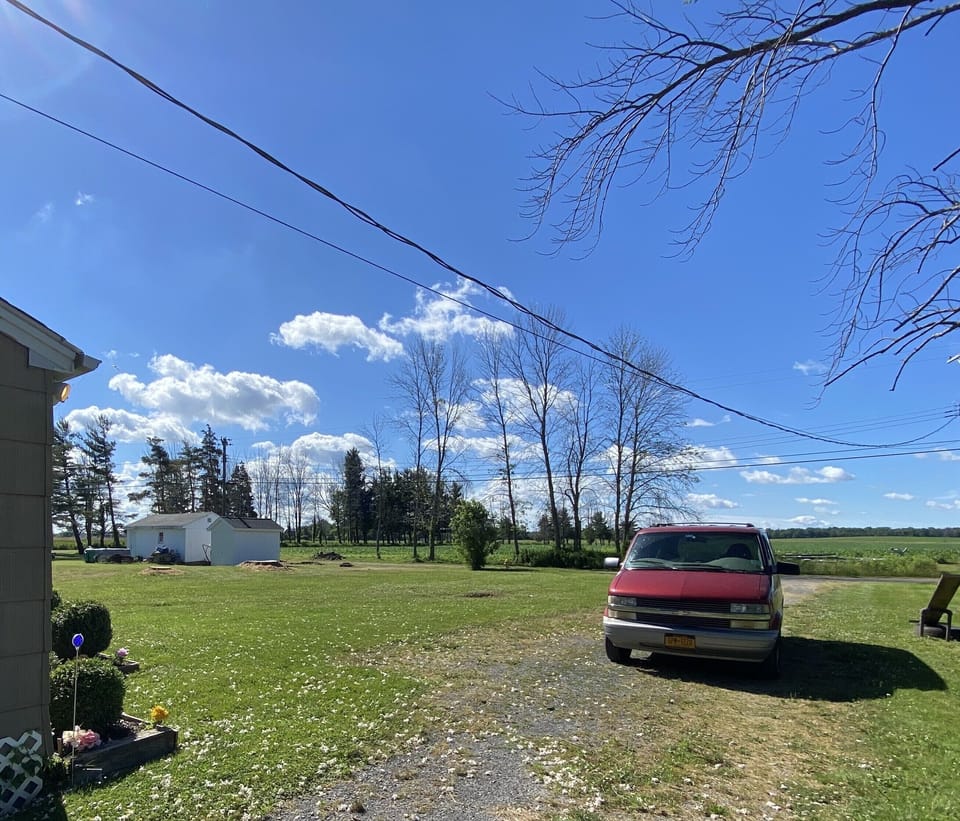Front yard faces farmland to the south