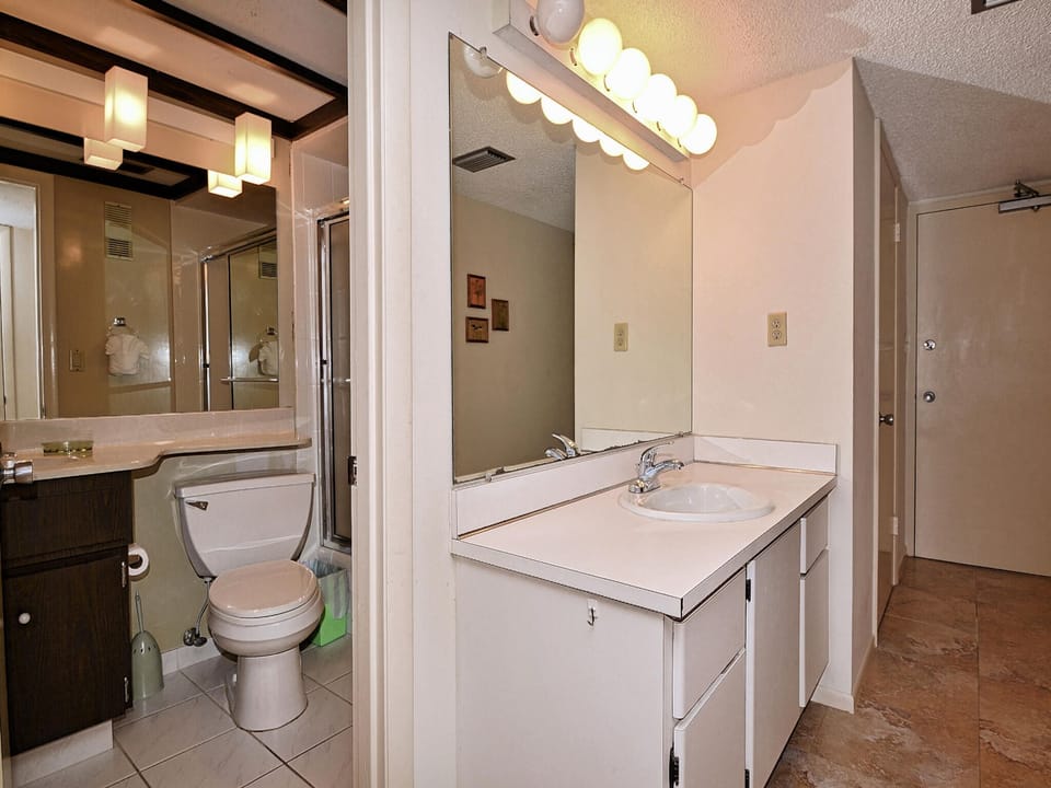 Master bedroom has separate vanity area.